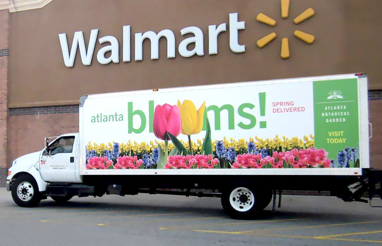 Image of a truckside advertising in Atlanta for a local attraction