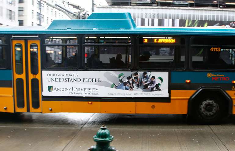 Image of a bus advertising display used to boost enrollment for an online university