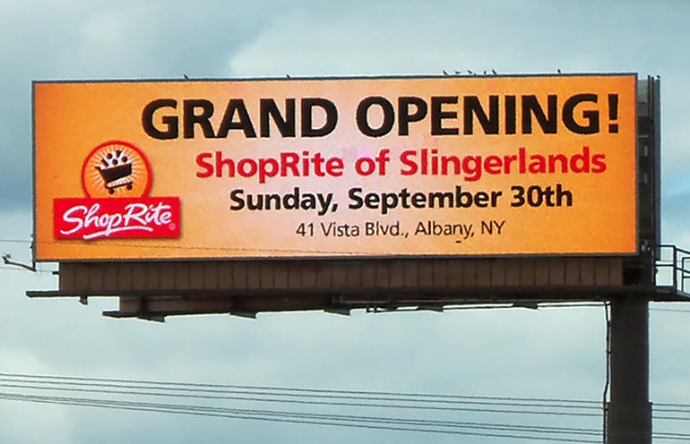 Image of a digital billboard used by a regional supermarket chain to promote a grand opening