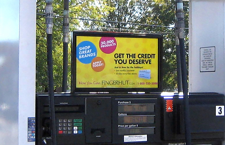 Image of gas station advertising media used to promote a website