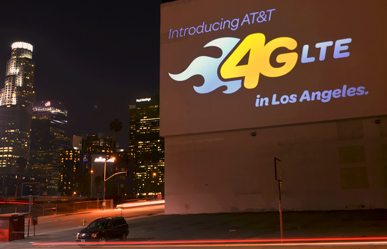 Image of a mobile projection advertising campaign in Los Angeles for a national cell phone service provider