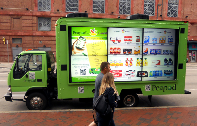 Image of video mobile billboard advertising to promote a grocery delivery service