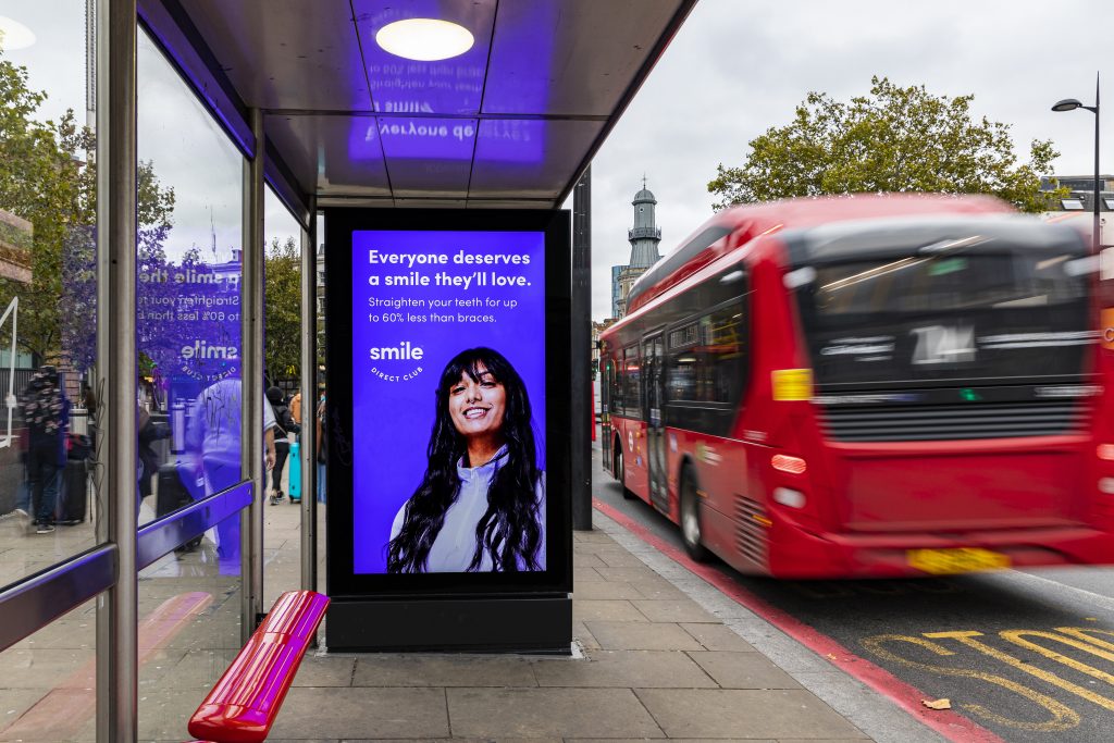 an image of a transit shelter advertisement that shows the importance of creative effectiveness in OOH